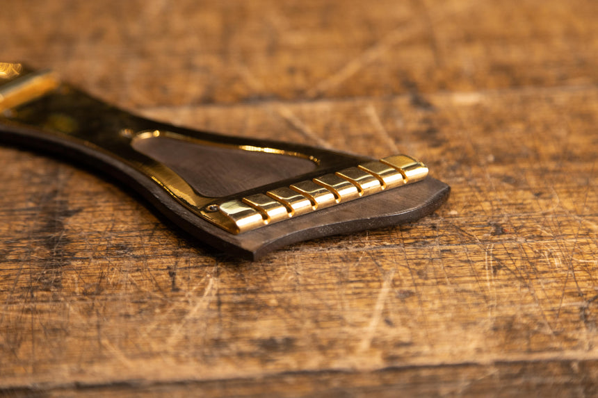 Eastman 7 string tail piece